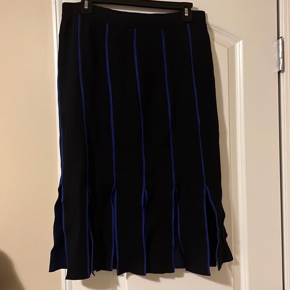 Black and blue sweater pencil skirt with fringe at the bottom of skirt